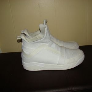 White pair of sneakers size 12.5